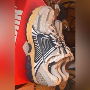 Nike Cream and Black Athletic Shoes